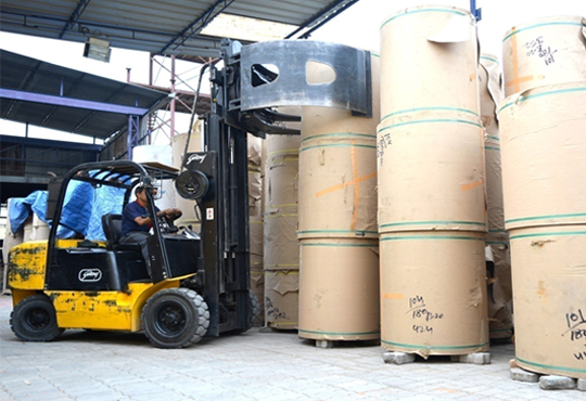 Fork lift with paper roll clamp for vertical  storage of reels