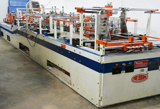 Automatic folder gluer for Mono cartons - Feeder side view