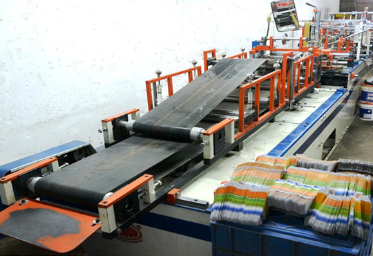 Automatic folder Gluer for Mono cartons delivery side view